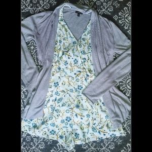 White romper with white and yellow flowers